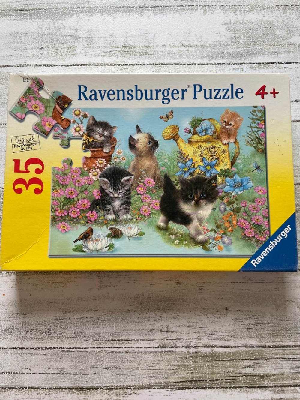 Ravensburger Yellow Box Kitten Puzzle with Blue and Pink Floral Art